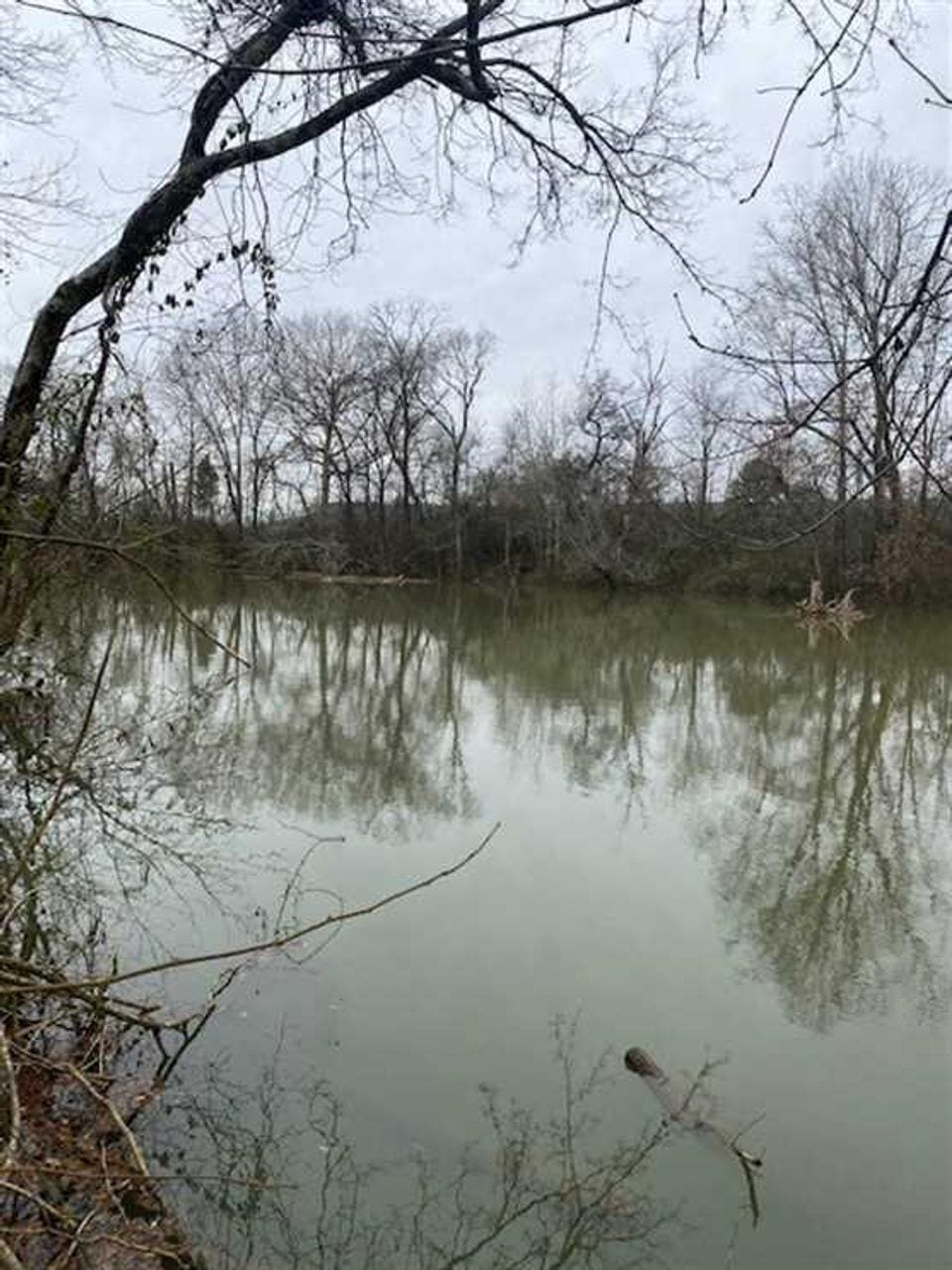 SOLD!! 5.00+/acres beautiful river front property. Mossy Oak