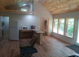 9.54+/-acres already set up for off the grid living. This property has a 640 sq ft off grid cabin with a 48 volt solar system.