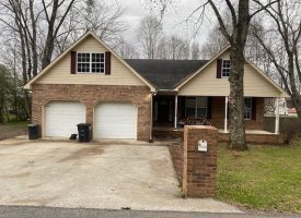 SOLD!! Beautiful and spacious two-level brick home nestled in the city of Jasper TN