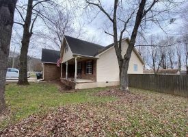 SOLD!! Beautiful and spacious two-level brick home nestled in the city of Jasper TN
