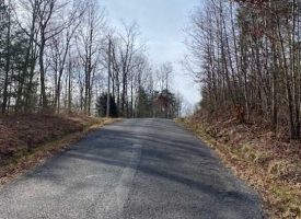 SOLD!! 5.00+/-acres Unrestricted wooded property with views of the Sequatchie Valley.