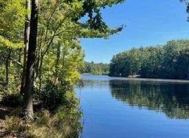 Beautiful lake front lot in highly desirable Cooley’s Rift
