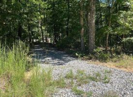 Beautiful lake front lot in highly desirable Cooley’s Rift