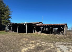 Come view this all-brick rancher nestled on 50.98+/-acres.