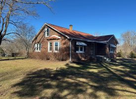 Come view this all-brick rancher nestled on 50.98+/-acres.