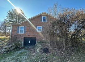 Come view this all-brick rancher nestled on 50.98+/-acres.