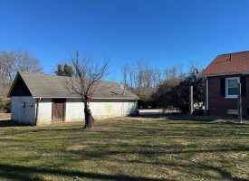 Come view this all-brick rancher nestled on 50.98+/-acres.