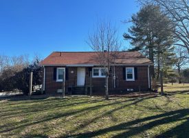 Come view this all-brick rancher nestled on 50.98+/-acres.