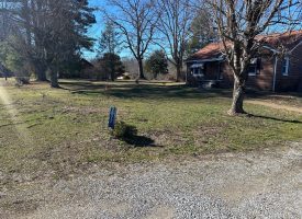 Come view this all-brick rancher nestled on 50.98+/-acres.