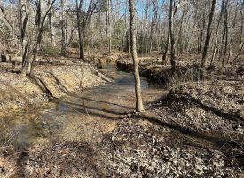 SOLD!! 3.25+/-acres Beautiful unrestricted wooded property with a creek