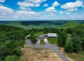 15+/-acres with Log Cabin with very private acres and views
