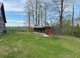 15+/-acres with Log Cabin with very private acres and views