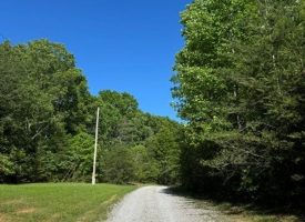 SOLD!! 5.85+/-acres Unrestricted wooded property with Electric and City Water At the Property
