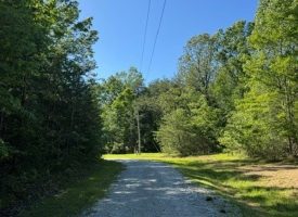 SOLD!! 5.85+/-acres Unrestricted wooded property with Electric and City Water At the Property