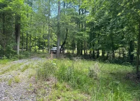 5.21+/-acres wooded property already set up to build your dream home
