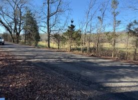 5.1+/-acres unrestricted Wooded Property