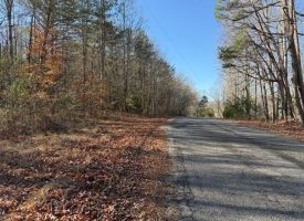 5.12+/-acres Unrestricted beautiful, wooded property.