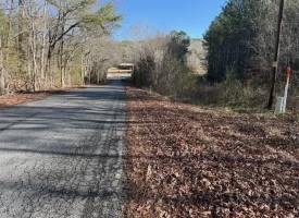 5.12+/-acres Unrestricted beautiful, wooded property.