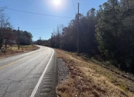 3.28+/-acres Unrestricted beautiful, wooded property.