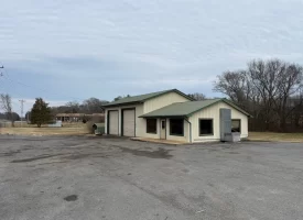 1.58+-acres with Mobile Home and Commercial Garage.