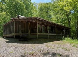 132.84+/-acres, with Rustic Hunting cabin that offers the ultimate private retreat in the mountains of Pikeville TN