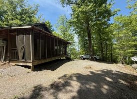 132.84+/-acres, with Rustic Hunting cabin that offers the ultimate private retreat in the mountains of Pikeville TN