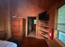 132.84+/-acres, with Rustic Hunting cabin that offers the ultimate private retreat in the mountains of Pikeville TN