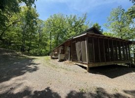 132.84+/-acres, with Rustic Hunting cabin that offers the ultimate private retreat in the mountains of Pikeville TN