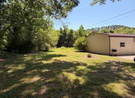 Charming and full of potential, this cozy home in Bridgeport AL